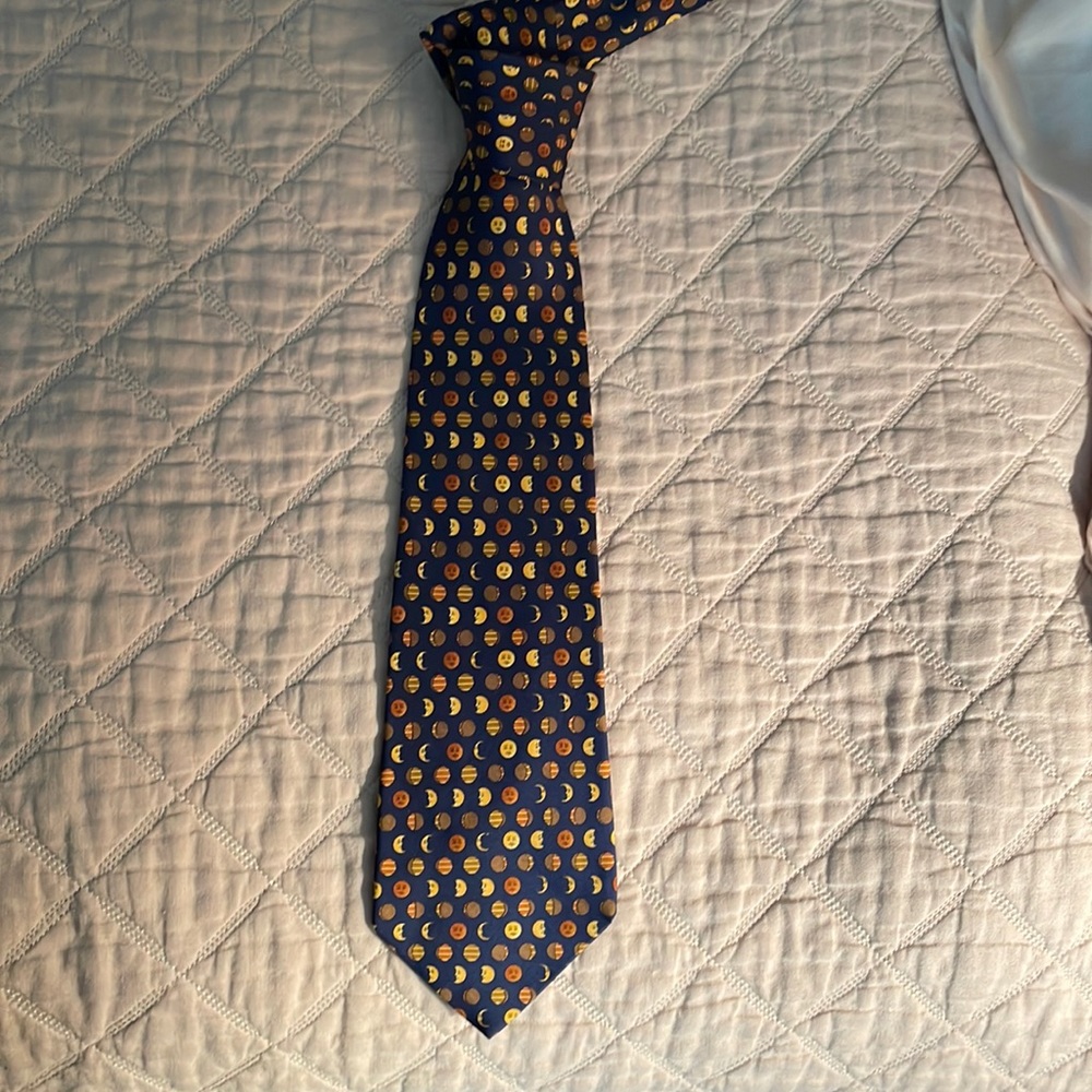 Men’s Ferragamo lunar phase tie.